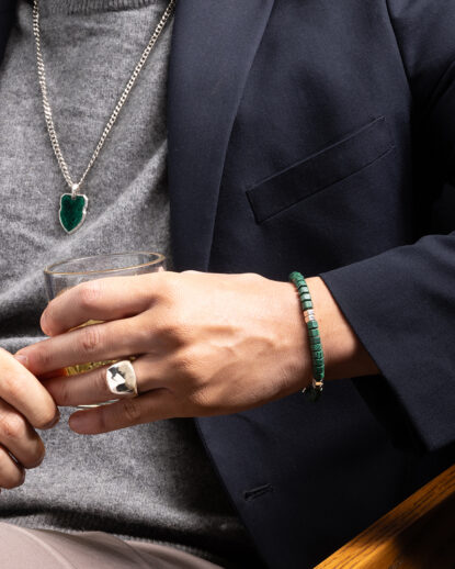 Malachite hexagon bracelet worn by men